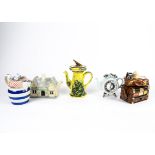 Novelty teapots, mostly Swineside or Paul Cardew, these include a sundial and explorer suitcase,