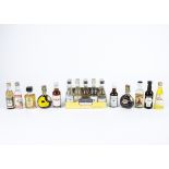 A quantity of miniature collectable spirit and liquor bottles with original contents, over two boxes