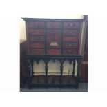 A 19th Century continental scarlet tortoiseshell and inlaid cabinet on stand, in the 17th century