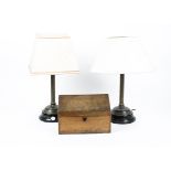 A pair of metal table lamps in the form of Doric columns, height to top of column, 31 cm, together