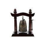 A 20th Century Korean ebonised prayer altar gong bell, having dragon decoration with engraved