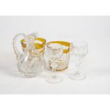 A pair of amber glass beakers, with moulded decoration in the form of horizontal lines or circles,