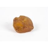 An Amber boulder of small size, uncut or polished, 7cm wide, 111g Provenance: believed to have