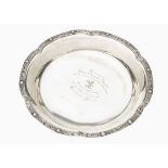 An Art Deco period silver presentation dish by W&W, having shaped rim with Celtic band, well with