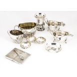 A collection of Victorian and later silver and white metal items, including a sugar basin and milk