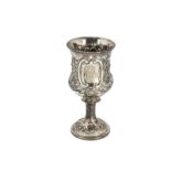 A Victorian silver trophy goblet by T.S, waisted bowl with raised foliage, having engraved