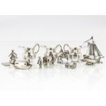 A group of ten small collectable silver and white metal items, including a set of three dolls' house