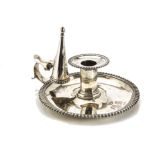 A good Victorian silver chamberstick from James Garrard, typical form with feathered rim and