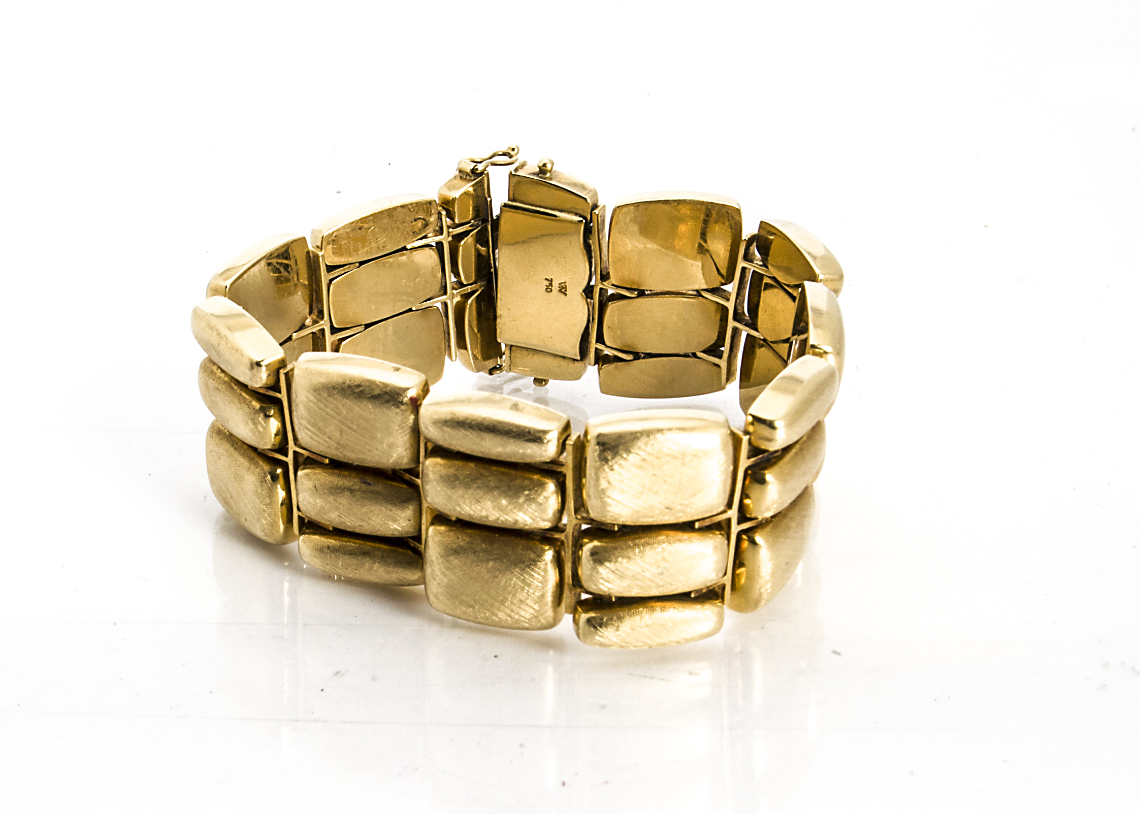 A continental retro style 18ct gold textured cuff bracelet, of rectangular form, made up of ten