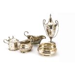 Five 20th century items of silver, including a twin handled trophy cup and cover, a mustard, with