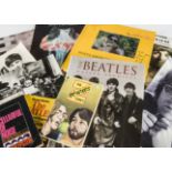 Beatles Memorabilia, twenty plus items that includes books ( A Cellarful of Noise, John, Postcards