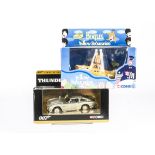 Beatles / James Bond, the model Yellow Submarine die cast model CC5801 and Thunderball Aston