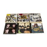 Beatles CDs, approximately thirty-eight CDs and CD sets by The Beatles and Solo including