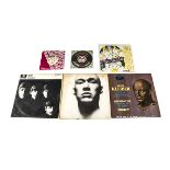 Records, approximately fifteen 7" singles and thirteen LPs of various genres including The