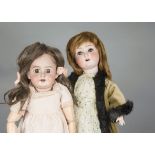 Two German bisque headed child dolls, an Armand Marseille 1894 with jointed composition body, pink
