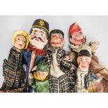 Five toy hand puppets, including a German composition headed policeman and Mrs Punch; and three