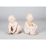 Two Gebruder Heubach naked babies, a crouching baby with hands between her feet —6in. (15cm.)