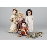 Four small dolls, a SFBJ 60 on straight legged body —9in. (23cm.) high; a Geburder Heubach 8094 on