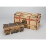 Two dolls’ trunks, a late 19th century beige and red oil-cloth trunk with wood and tinplate