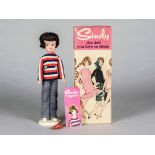 A rare Pedigree Sindy doll, 12GSS, brunette in Weekender with rare head band, booklet, stand, in