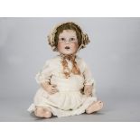 A large SFBJ 251 character baby, with blue sleeping eyes, open mouth with moulded top teen,