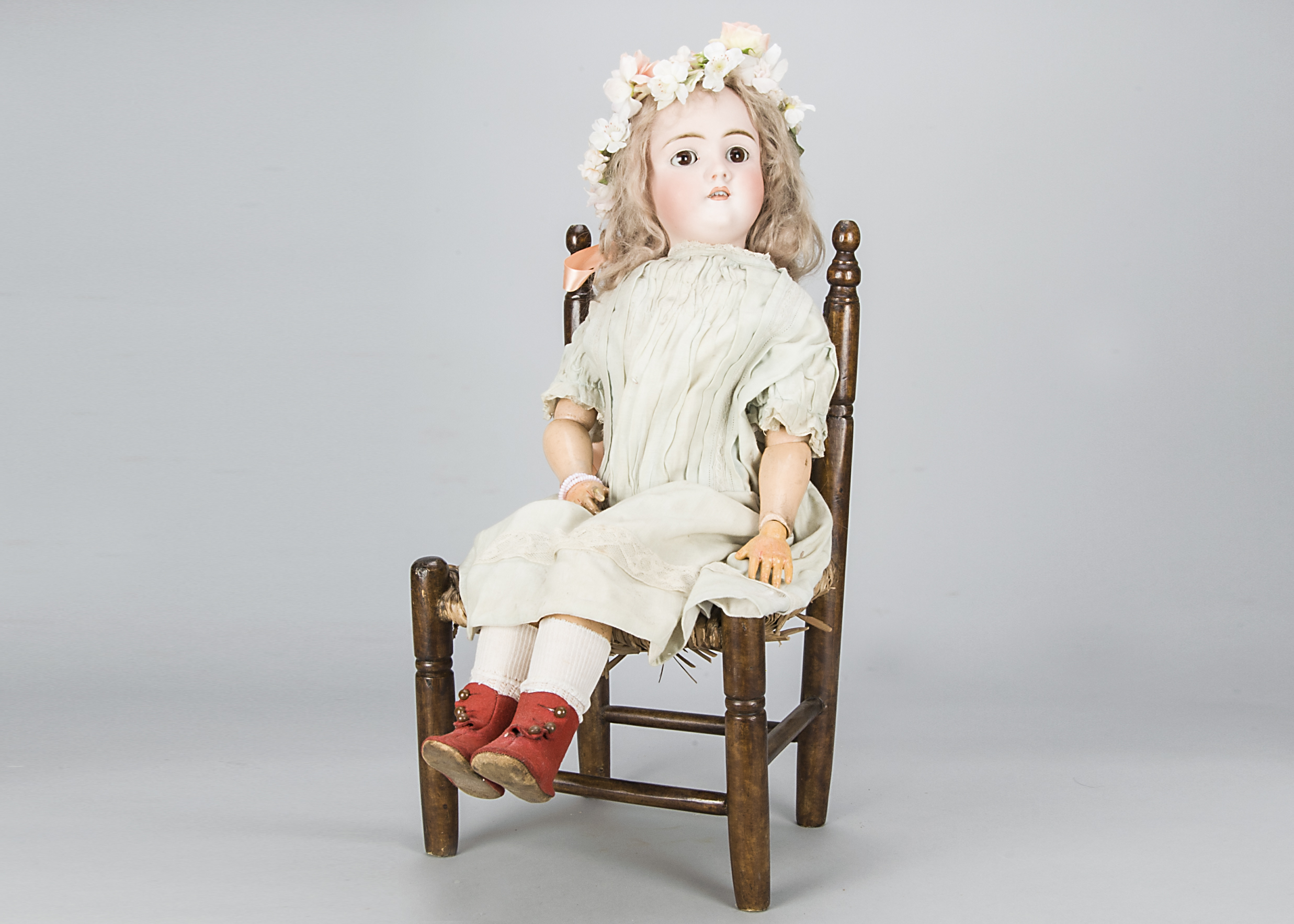A large Kley & Hahn Walkure child doll, with brown sleeping eyes, pierced ears, blonde mohair wig,
