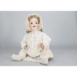 A large Ernst Heubach 342 baby doll, with brown sleeping eyes, blonde hair wig, composition bent-