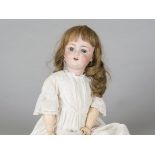 A Simon & Halbig for CMB child doll, with blue sleeping eyes, pierced ears, replaced light brown