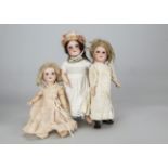 Three German child dolls, a C M Bergmann 1916 with blue sleeping eyes, brown mohair wig, jointed