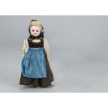 A German small all-bisque child doll, probably Simon & Halbig with socket head, brown sleeping eyes,