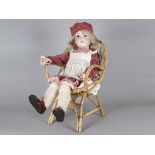 A large Armand Marseille 390 child doll, with blue sleeping eyes, replacement blonde wig, jointed