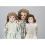 Three German child dolls, a Max Oscar Arnold 201 with brown sleeping eyes, blonde mohair wig,