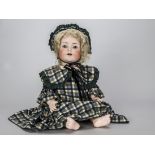 A Simon & Halbig 1294 character baby, with blue sleeping eyes, blonde mohair wig, bent limbed