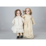 Two German bisque headed child dolls, one marked C with blue sleeping eyes, dark blonde mohair