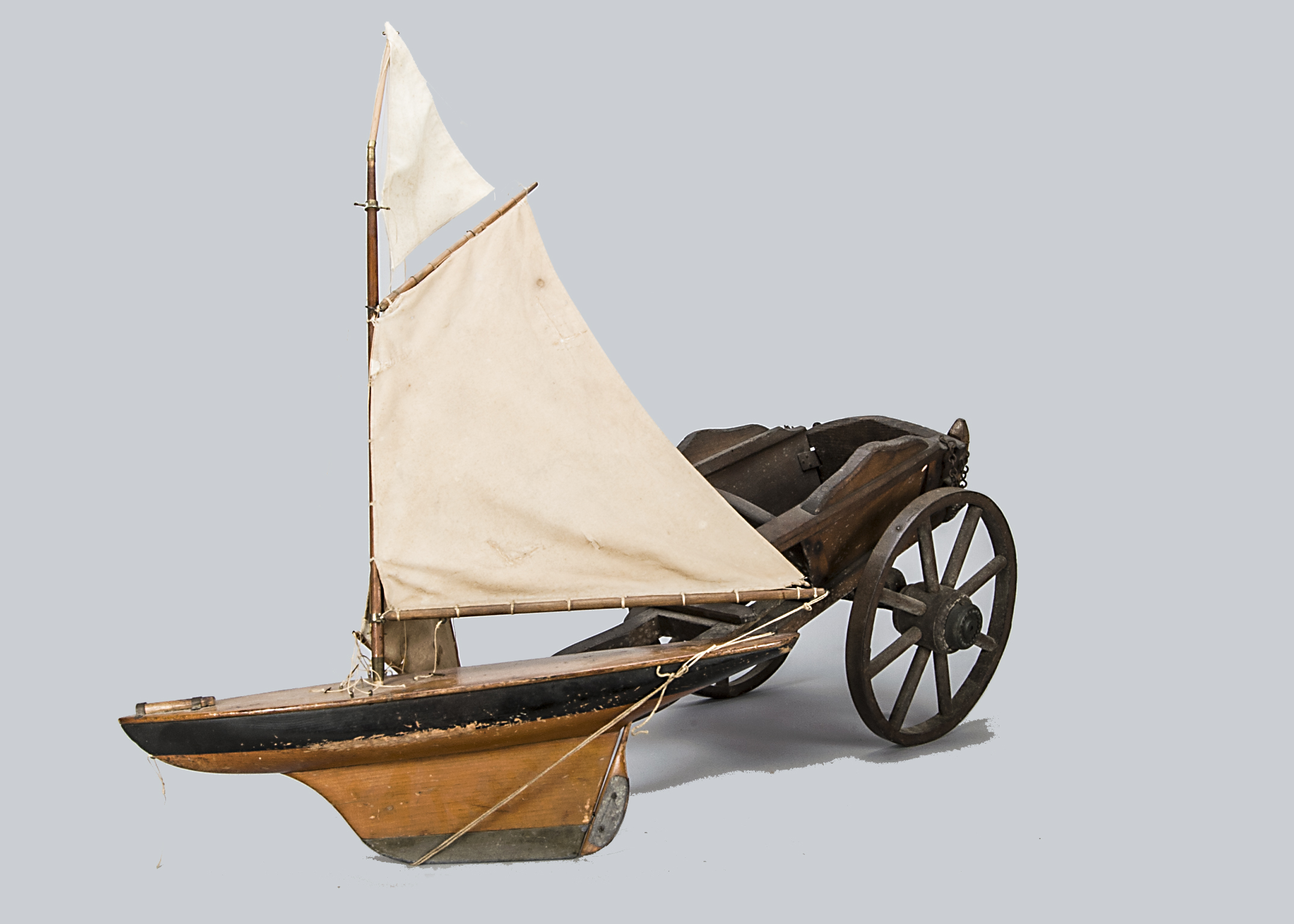 A British wooden farm cart, probably G & J Lines, with Queen Victoria 1887 Jubilee circular metal