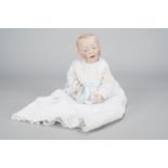 A Kammer & Reinhardt 100 character baby, with blue painted eyes, open/closed mouth, blonde painted