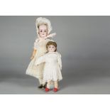 Two German bisque headed child dolls, an Armand Marseille Floradora with brown sleeping eyes, blonde