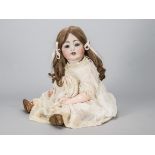 A large Konig & Wernicke 99 character baby, with blue sleeping eyes, strawberry blonde hair wig,