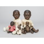 German black babies, an Ernst Heubach 300 painted bisque baby —8in. (20cm.) high (missing wig);