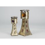 Two German tinplate lighthouse lanterns, gold spirit finish, coloured celluloid window panes, candle