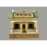 An unusual German dolls’ house for Moko, with cream painted facade, verandah across entire front,