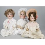 Three German character baby dolls, a Simon & Halbig for Kammer & Reinhardt 126 —20in. (51cm.)