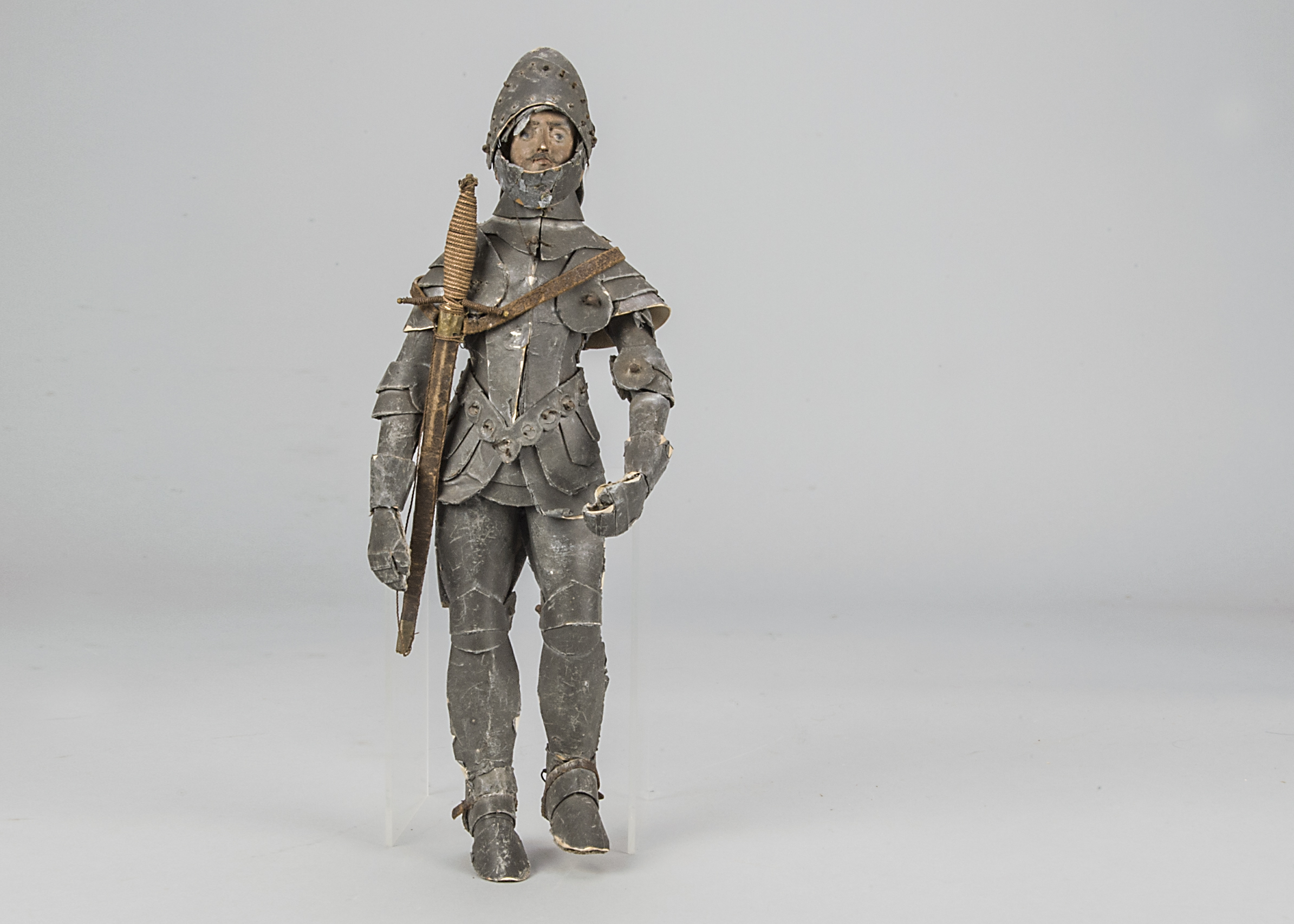 An interesting knight in armour, the figure with composition face, soft stuffed body, card
