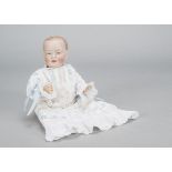 An Eisenmann & Co character baby, with blue intaglio eyes, open/closed mouth, blonde painted hair,