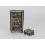 A Rock & Graner tinplate manivelle music box, the grained wood circular tinplate box with crank