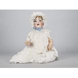 A Simon & Halbig for Kammer & Reinhardt 126 character baby, with blue sleeping eyes, blonde mohair