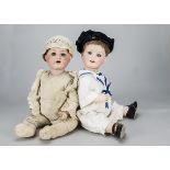 Two large German character baby dolls, an Armand Marseille 992 with blue sleeping eyes, brown mohair