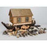 A paper-covered Noah’s Ark, with stained wooden hull, the house covered in different papers and