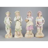 Two pairs of Gebruder Heubach of children figures, one pair dressed in pink representing a fisherman