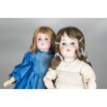 Two German bisque headed child dolls, a doll marked 55 with blue lashed sleeping eyes, brown hair